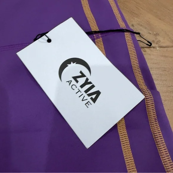 ZYIA Active Purple Game Day Performance 7/8 Leggings Yellow Cuffs size 4 NWT - Picture 2 of 10